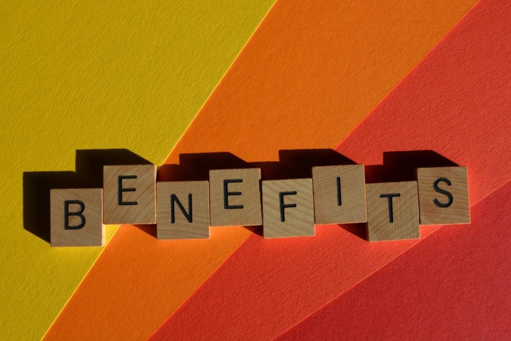 render of the word "benefits" spelled on wooden blocks