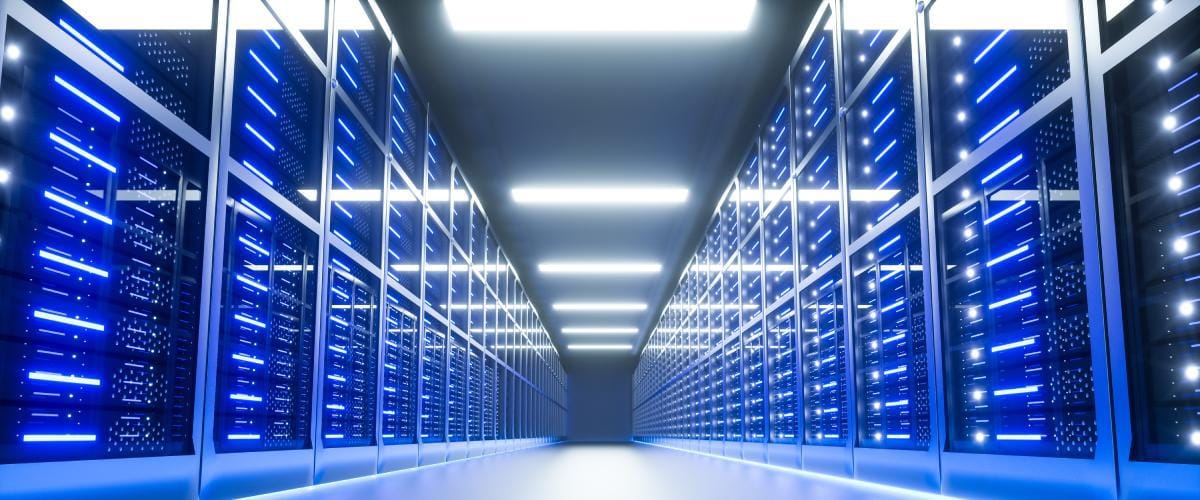 3D render of a server room showing stacks of servers down a long aisle