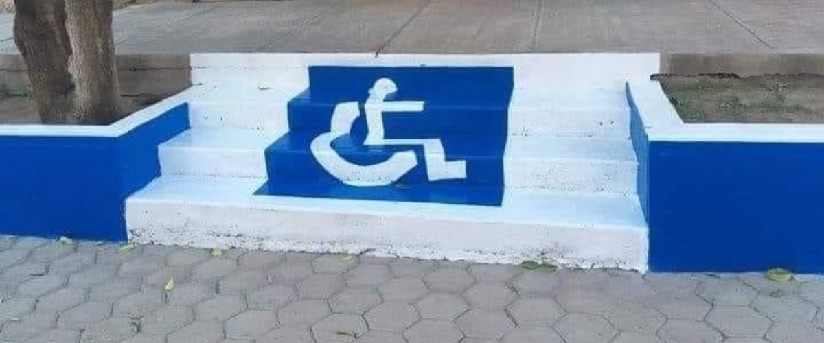 photo of a handicap sign painted on stairs