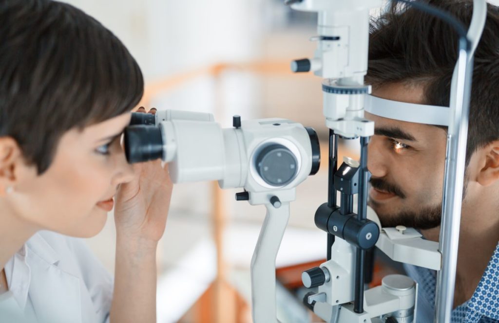 Optometrist carrying out an eye test.
